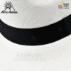 A white and black hat with a BLACK hatband with loop or bow in various sizes.